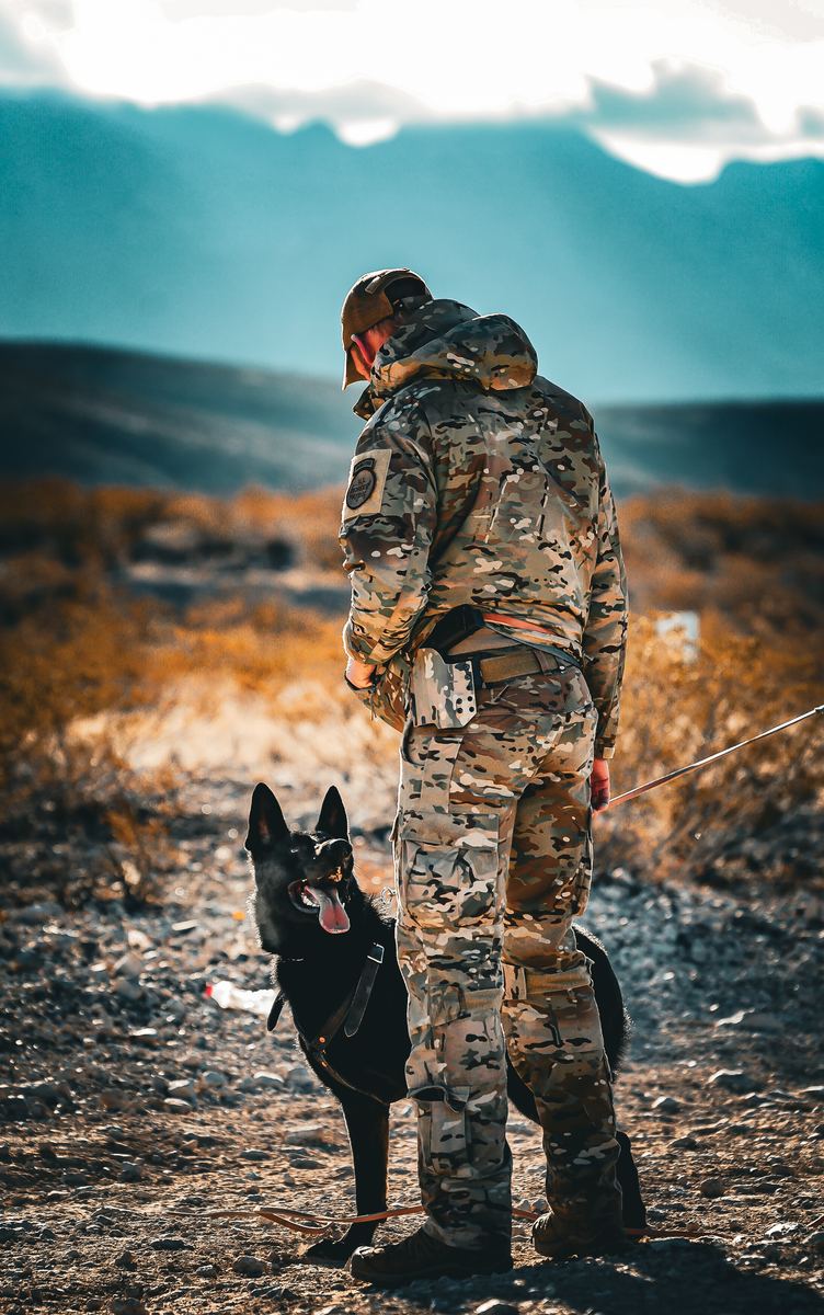 Handler and K9 in the desert